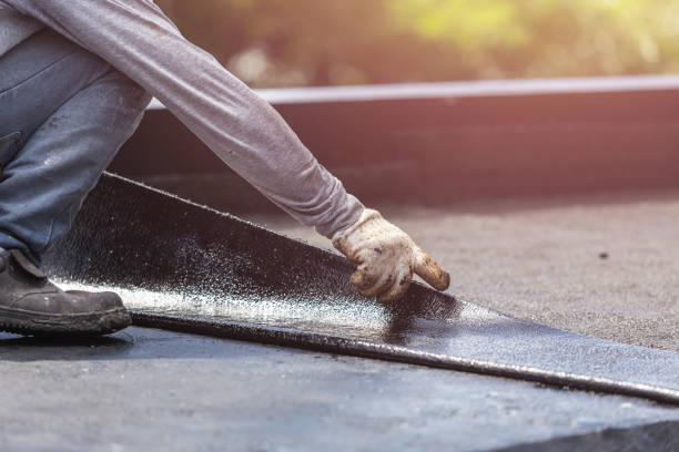 Professional Basement Waterproofing technician working in Wakeman, OH